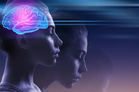 Profil kobiety z podświetlonym mózgiem, symbolizującym myśli i emocje. Co to dopamina? To neuroprzekaźnik radości i motywacji.